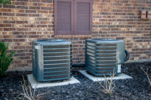 air conditioning units outside of a brick building