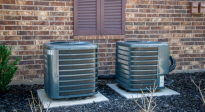 air conditioning units outside of a brick building