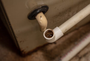 drain has become plugged and must be cleaned