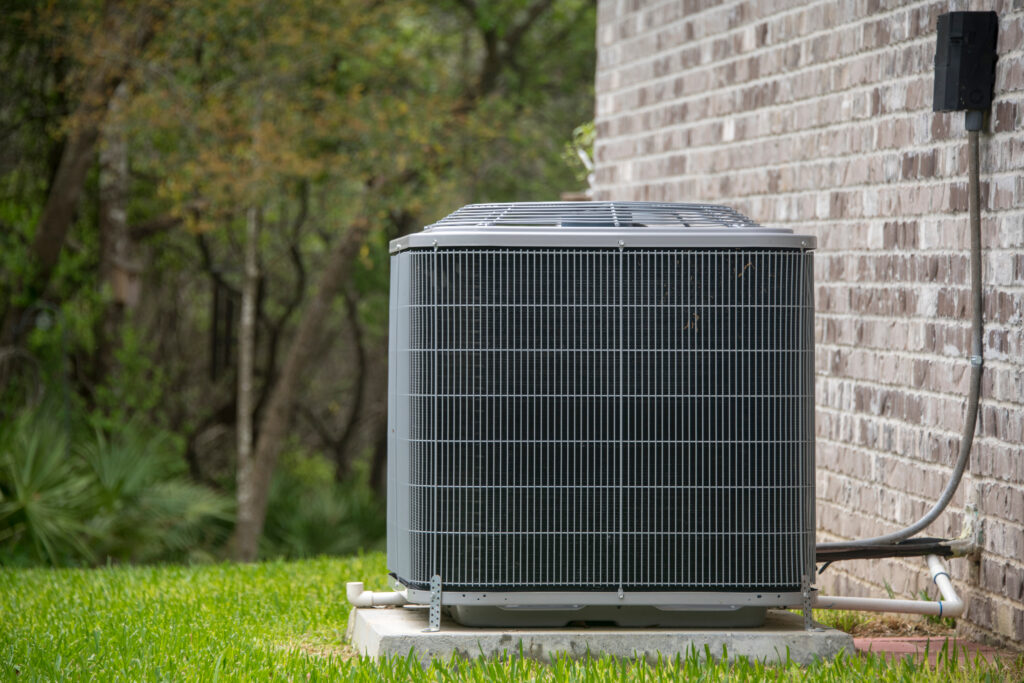 hvac unit on concrete slab with new construction