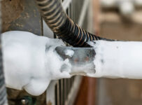 close up of frozen ac pipes