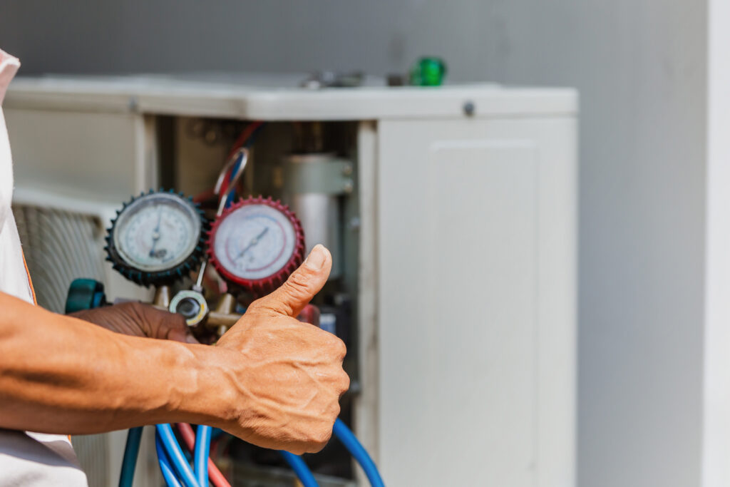 close up of ac repairman on the floor