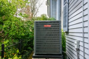 new goodman iar conditioner unit in backyard of home