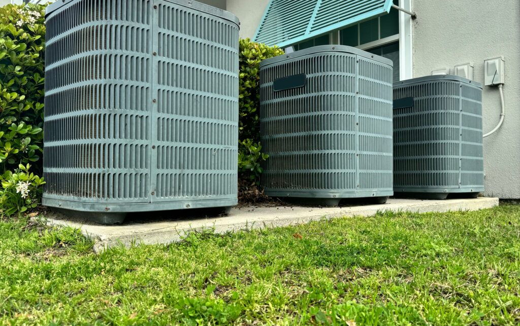 hvac unit installed on a concrete slab in a yard