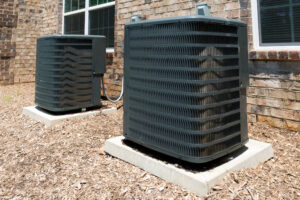 two outdoor ac units side by side