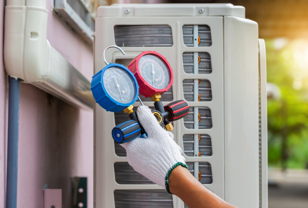 close up of hvac technician doing hvac maintenance