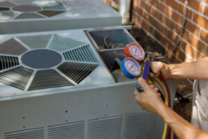 ac technician preparing to service unit