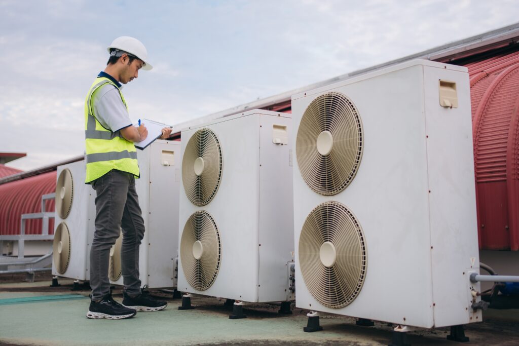 engineer checking the ac cooling system