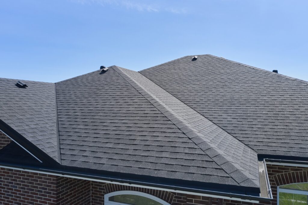 aerial view of shingles of a roof on a residential home