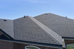 aerial view of shingles of a roof on a residential home