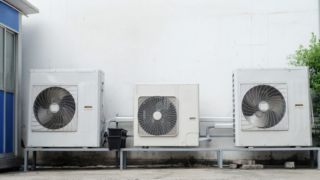 outdoor hvac units mounted on concrete slab