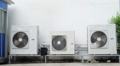 outdoor hvac units mounted on concrete slab