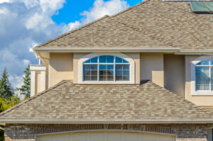 roof of home featuring nice windows
