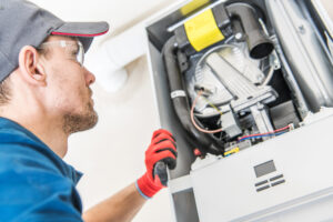 technician working on a heater issue