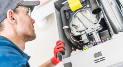 technician working on a heater issue