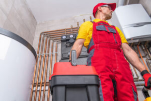 hvac worker performing maintenance