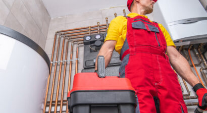 hvac worker performing maintenance