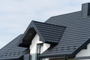 modern house covered with black metal tiles