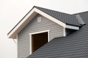 wooden house with a view of upper roof