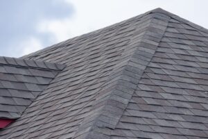 a roof with tan and gray shingles