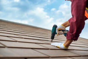 repairman working on a roof