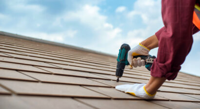 repairman working on a roof