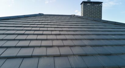 close up of house roof with ceramic shingles