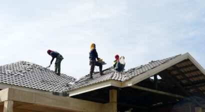 roofers with gray cement roof tiles