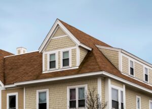 dormer windows on the sloped side of a residential roof