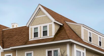 dormer windows on the sloped side of a residential roof