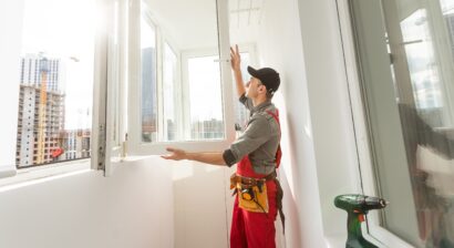 worker doing an indoor window installation process