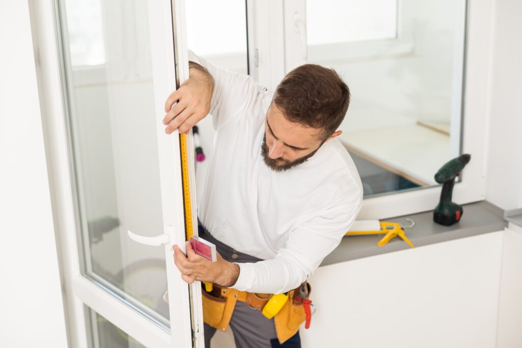 repairing of a plastic window by a worker