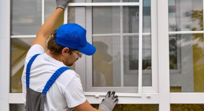 experienced worker working on window