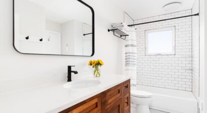 a cozy farmhouse bathroom with marble countertop