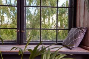 big wooden window with frame and nature