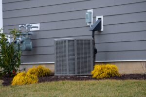 air conditioner unit near a new house