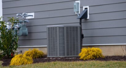 air conditioner unit near a new house
