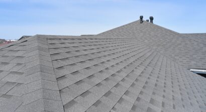 luxury house roof with asphalt shingles