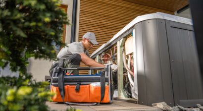 technician performing hot tub maintenance