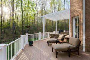 elegant backyard deck with lounge chairs and pergola