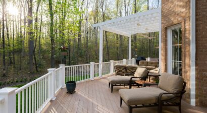 elegant backyard deck with lounge chairs and pergola