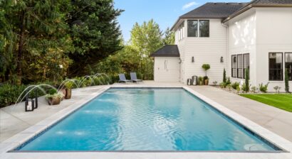 swimming pool in backyard of luxury home