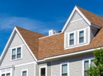 family home with blue sky in background