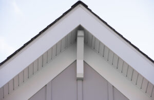 white brackets on a triangle gable roof