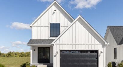 large white home with board and batten siding