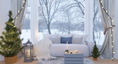 interior of living room in winter with Christmas tree