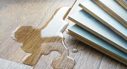 water spilled on floor next to flooring samples