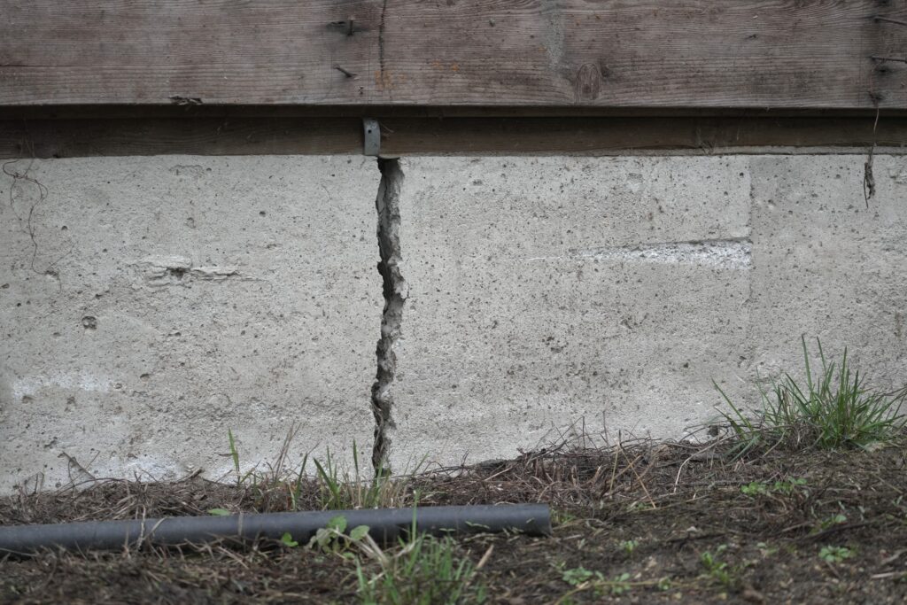 close up of a deep house foundation crack