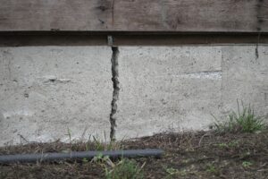 close up of a deep house foundation crack
