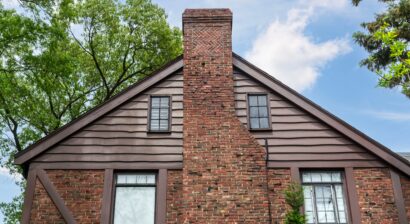 traditional house exterior with multiple types of siding